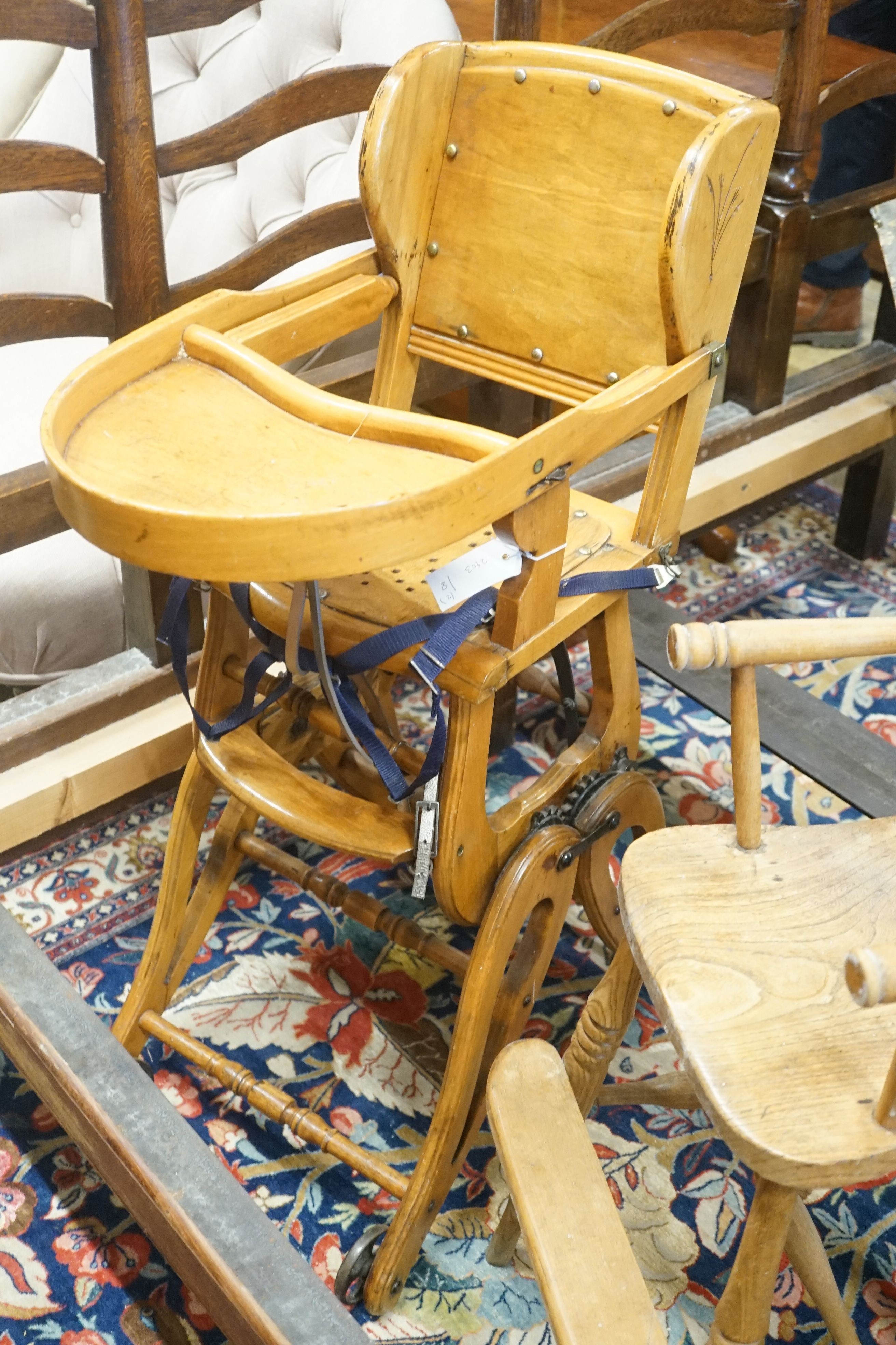 An early 20th century metamorphic child's high chair, together with a Victorian Windsor high chair